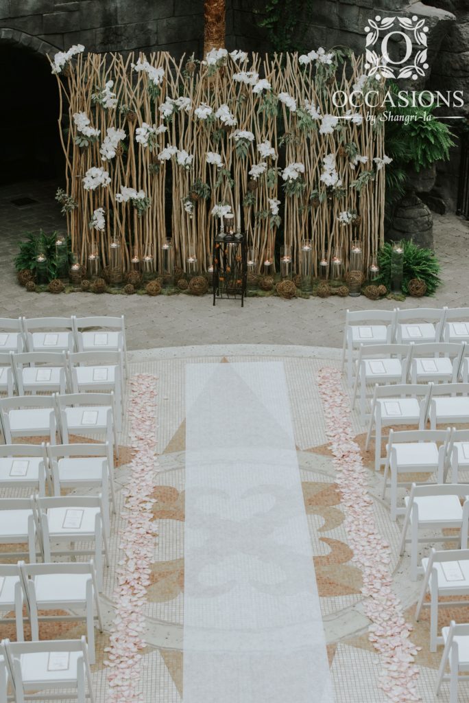 Whimsical Branch Wedding Ceremony Altar with White Orchids, Candles, and Greenery #OBSevents